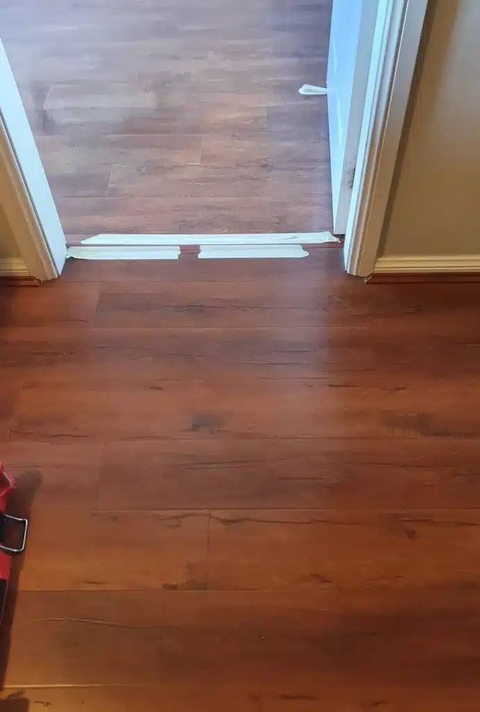 After image showing the laminate floor repaired and free of scratches