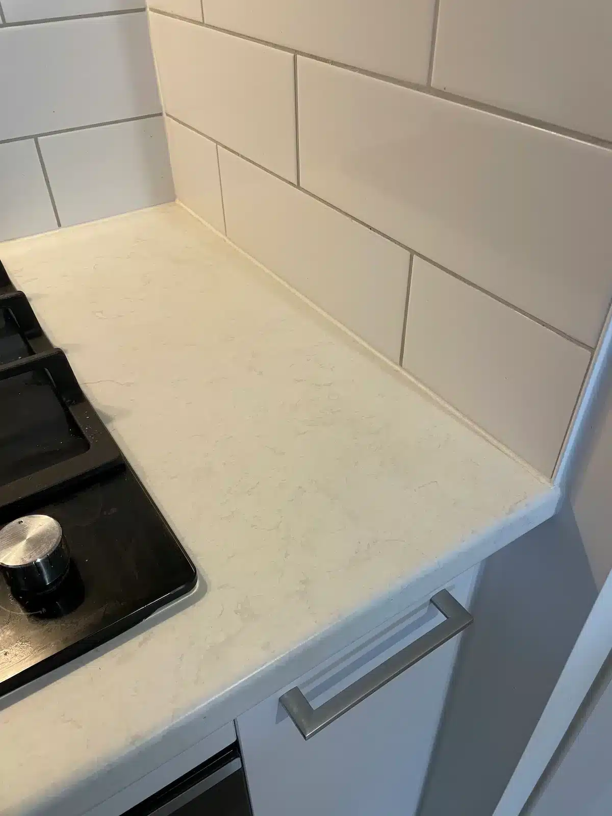 Stone-look benchtop fully restored after Surface Care burn-mark repair