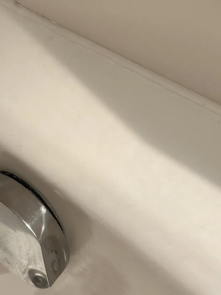 The same spot after the chip was treated, filled and sealed