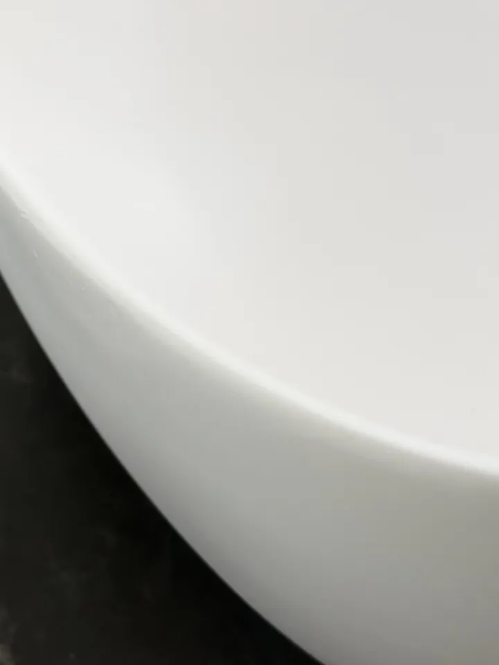 The same side of the basin after the chip was repaired